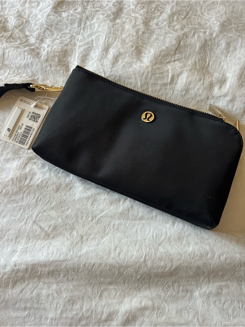 lululemon athletica Black Wristlet with Gold Hardware